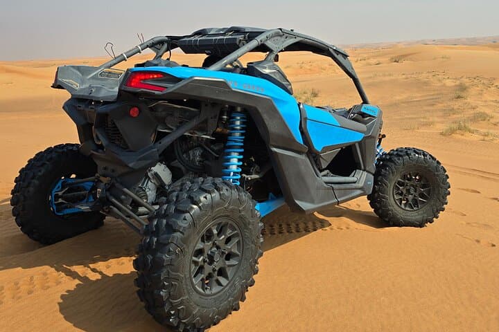 Dubai Morning CAN‑AM Buggy Safari — Sandboarding & Camel Ride in the Red Dunes photo 6