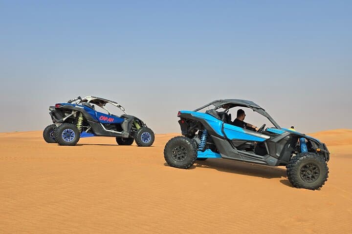 Dubai Morning CAN‑AM Buggy Safari — Sandboarding & Camel Ride in the Red Dunes