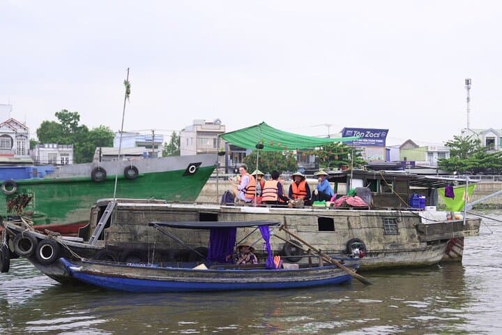 Cai Rang Morning Cruise: Can Tho Floating Market & Fruit Garden Tour photo 3