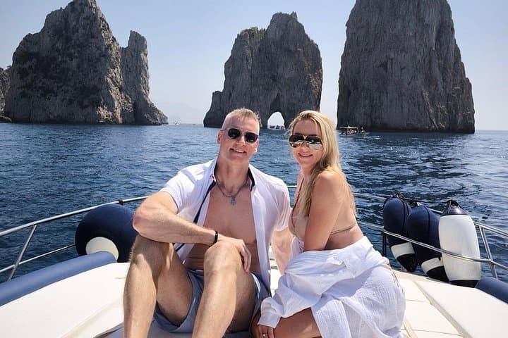 Capri Private Boat Tour to Nerano: Blue Grotto, Faraglioni & Coastal Lunch Stop photo 2