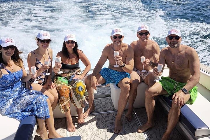 Capri Private Boat Tour to Nerano: Blue Grotto, Faraglioni & Coastal Lunch Stop photo 1