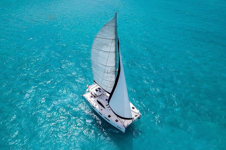 Luxury Catamaran Sailing to Isla Mujeres: Snorkel, Beach & Open Bar from Cancun photo 1