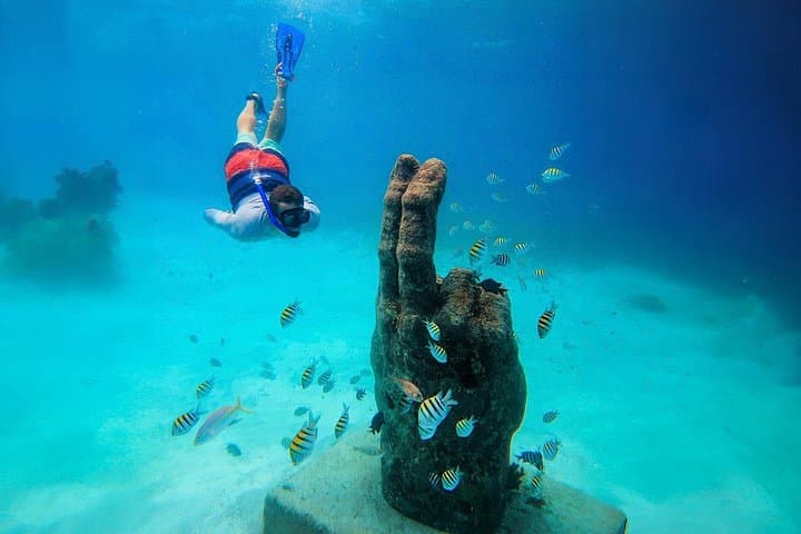 Luxury Catamaran Sailing to Isla Mujeres: Snorkel, Beach & Open Bar from Cancun photo 3