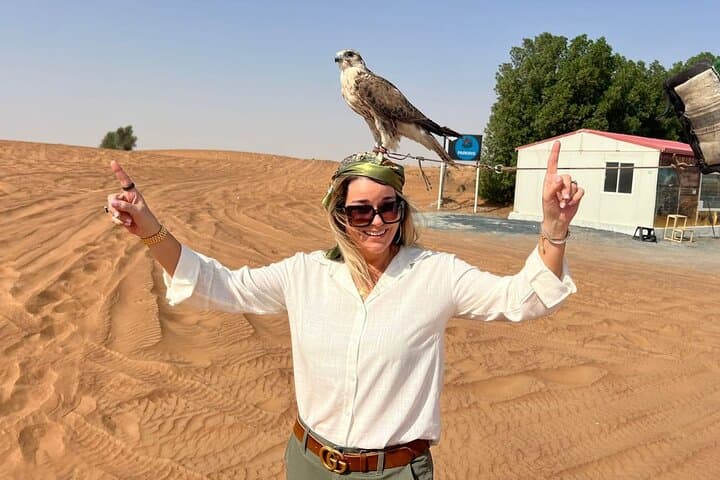 Dubai Red Dunes Safari: Quad Bike, Camel Ride & BBQ Experience