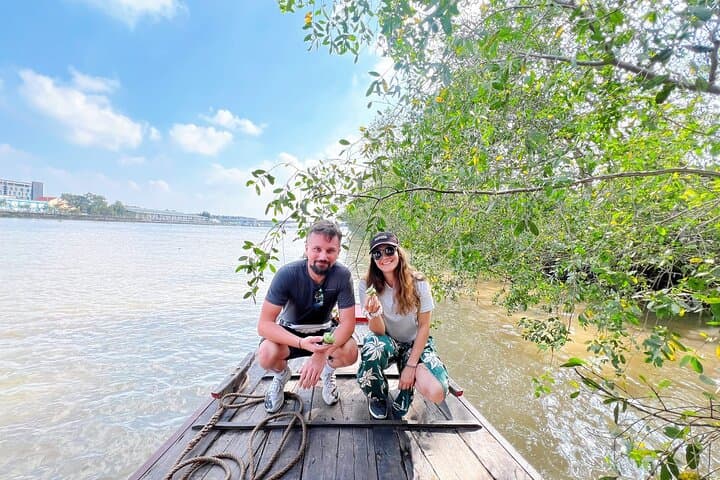 Cu Chi Tunnels & Mekong Delta Day Trip from Ho Chi Minh City — Tunnels, Boats, and Orchard Stops photo 3