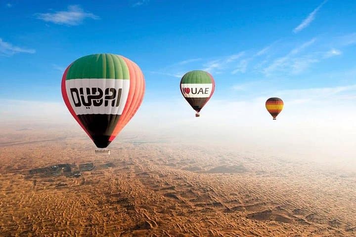 Sunrise Hot Air Balloon Over the Dubai Desert with Falcon Show photo 1