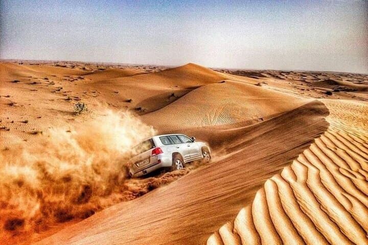 Dubai Desert Safari: Dune Bashing, Camel Rides & Bedouin BBQ Evening photo 4