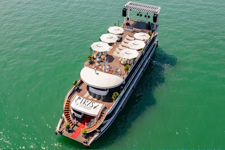 Halong Bay Day Cruise on IRIS: Kayaking, Caves & Sunset Canapé Party