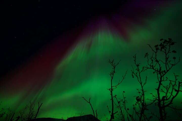 Tromsø Northern Lights Chase: Guided Aurora Tour with Hot Meal & Thermal Suits photo 4