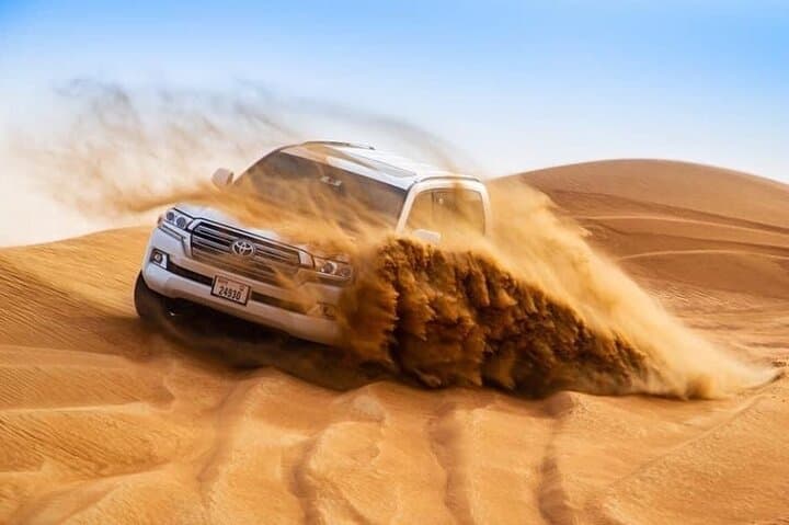 Evening Desert Safari at Lahbab Red Dunes — Dune Bashing, Camel Ride & BBQ