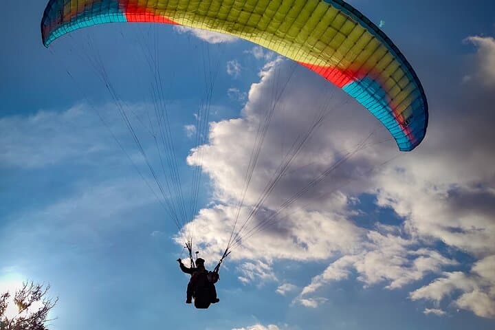 Tandem Paragliding Over Medellín — 15-Minute Flight with Transport