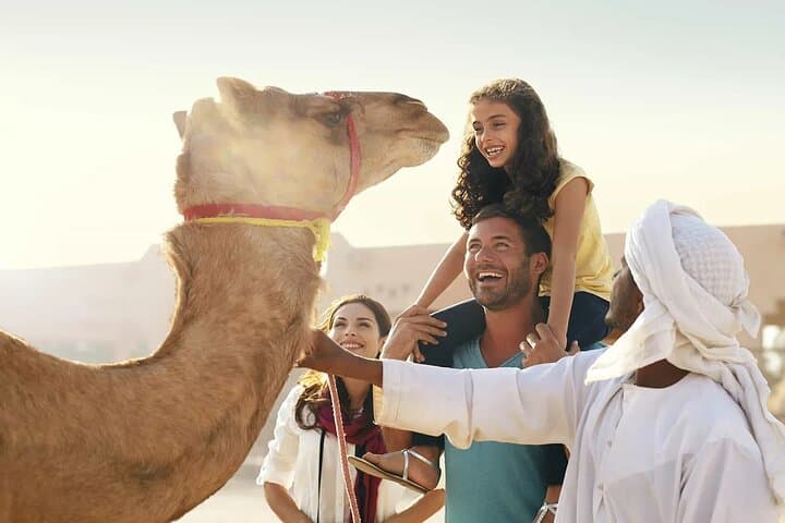Evening Red Dune Safari in Dubai: Dune Bashing, Camel Ride & Live Desert Show photo 3