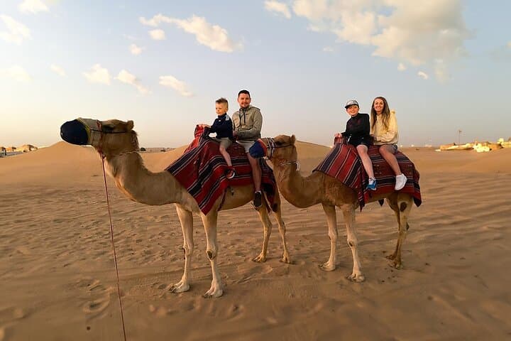 Morning Red Dune Safari with Camel Trekking and Sandboarding in Dubai photo 1
