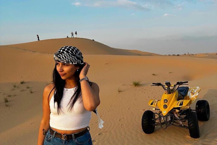 Evening Desert Safari in Abu Dhabi: Quad Bike, Dune Bashing & Live BBQ