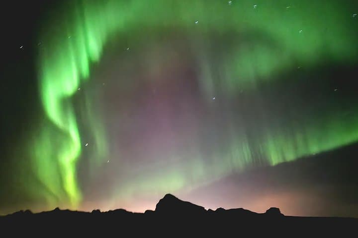 Reykjavik Northern Lights Evening Adventure — Guided Bus Tour to Aurora Viewing photo 1