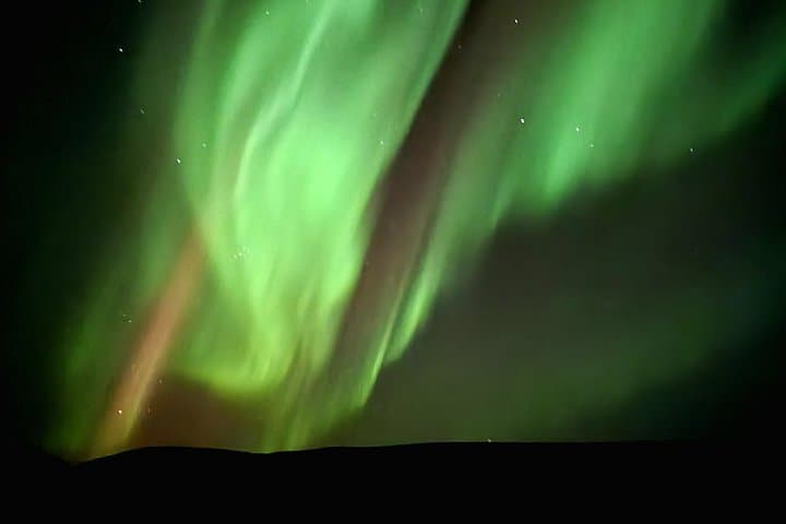 Reykjavik Northern Lights Evening Adventure — Guided Bus Tour to Aurora Viewing photo 2