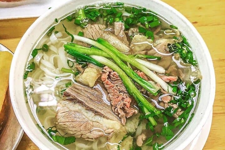 Saigon Night Street Food Tour by Scooter: Authentic Eats in 4 Hours photo 2