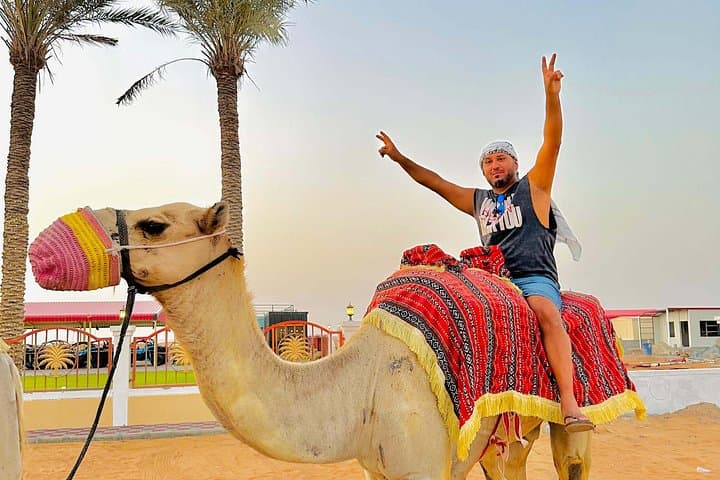 Private Morning Desert Safari: Sandboarding, Camel Ride & Dune Bashing in Dubai