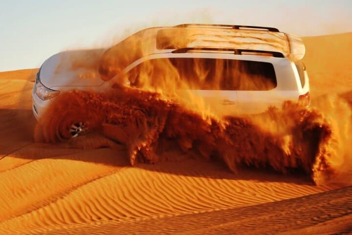 Evening Dubai Desert Safari with Dune Bashing and BBQ Dinner