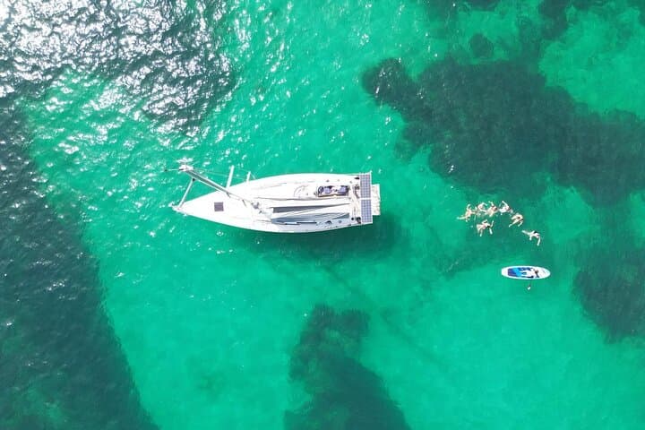 Palma Bay Sailing: Half-Day Charter with Paddleboarding, Snorkel & Mallorcan Tapas