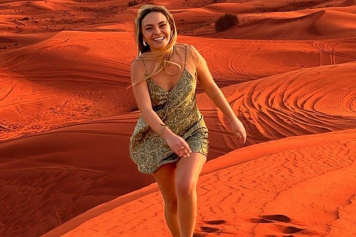 Morning Desert Safari in Dubai's Red Dunes — Dune Bashing, Sandboarding & Camel Ride photo 4