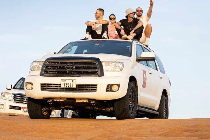 Dubai Evening Desert Safari & BBQ Dinner — Sunset Dune-Bashing and Bedouin Camp Experience photo 2