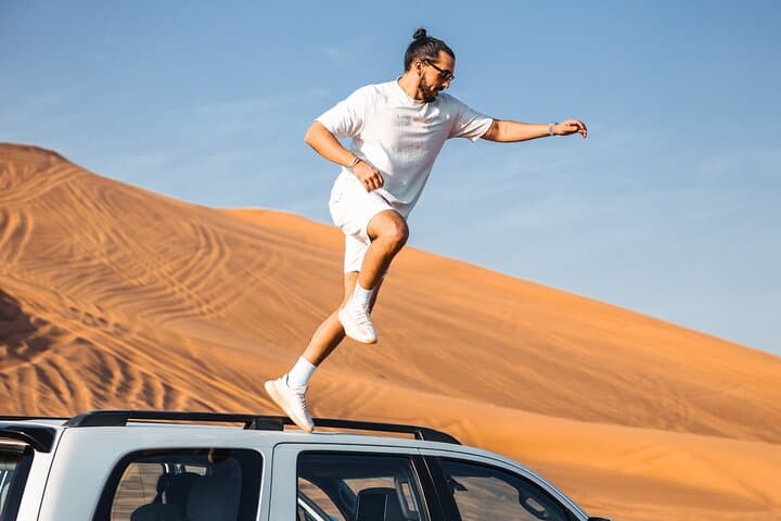 Dubai Evening Desert Safari & BBQ Dinner — Sunset Dune-Bashing and Bedouin Camp Experience photo 3