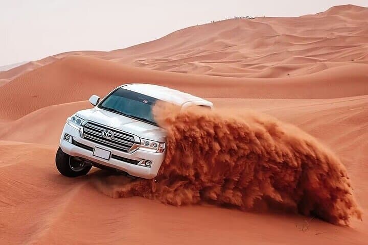 Premium Dubai Desert Safari: Dune Buggy, Sandboarding & VIP BBQ Under the Stars photo 2