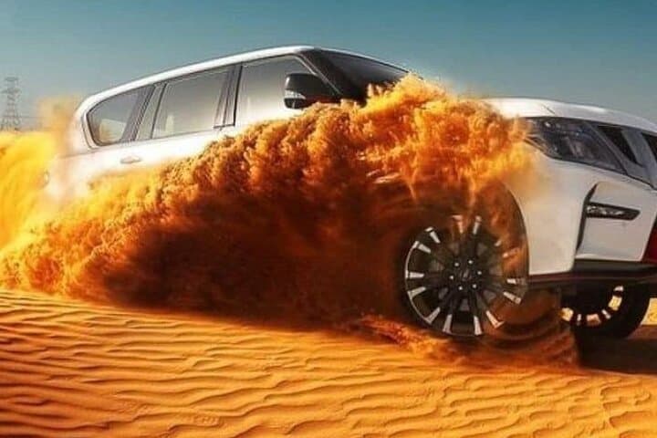 Dubai Desert Safari: Dune Bashing, Camel Rides & Stargazing BBQ Experience photo 3