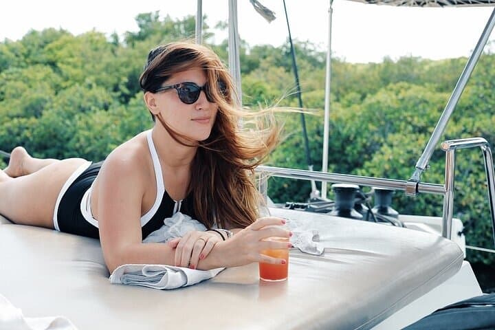 Catamaran Party to Isla Mujeres: Sailing, Snorkel & Beach Lunch from Cancun