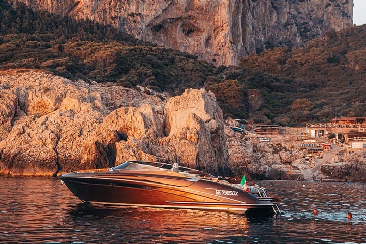 Sunset Riva 44 Champagne Cruise Around Capri's Faraglioni photo 2