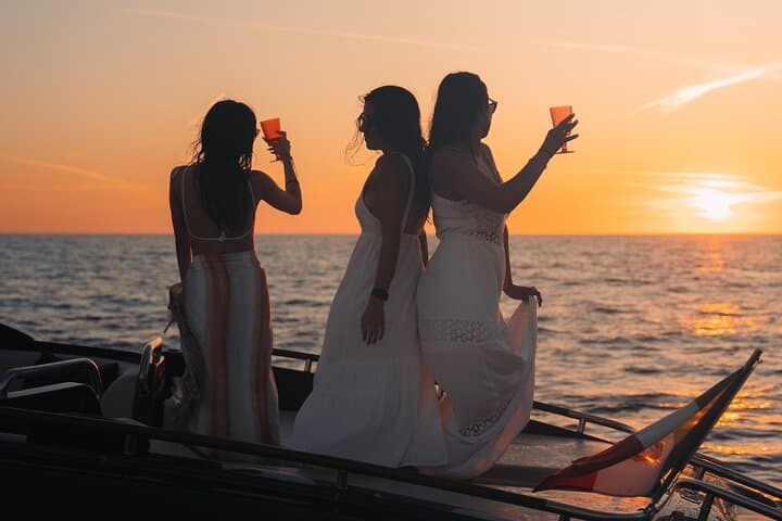 Sunset Riva 44 Champagne Cruise Around Capri's Faraglioni