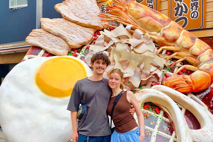 Shinsekai to Dotonbori: Osaka Walking Food Tour with a Local Guide photo 6