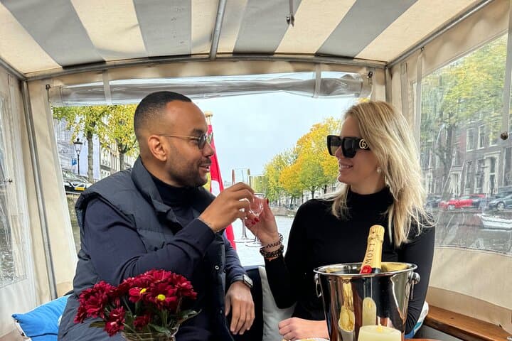 Private Amsterdam Saloon Boat: 2-Hour Canal Cruise with Snacks & Open Bar