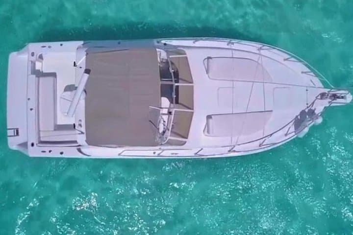Private Yacht Rental in Cancún: Snorkel Isla Mujeres, Swim Playa Norte & Sunset Cruises
