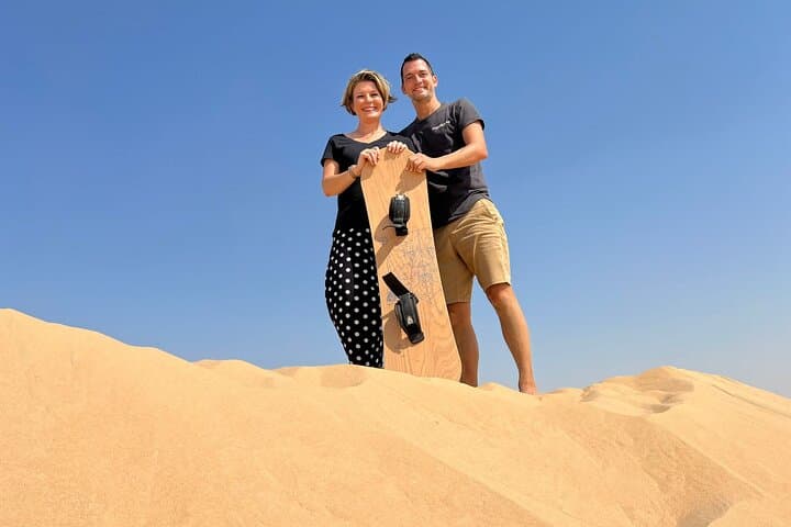 Private Abu Dhabi Sunset Desert Safari with Sandboarding: Dune Bashing & Camel Farm Visit photo 2