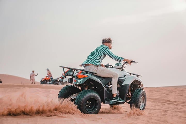 Dubai Desert Quad Bike Safari: ATV Ride, Camel Experience & Dune Photo Stop photo 3