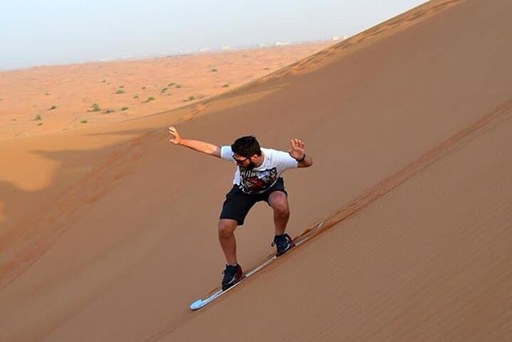 Dubai Morning Desert Safari with Camel Ride and Sandboarding