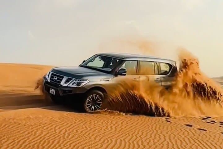 Dubai Morning Desert Safari with Camel Ride and Sandboarding photo 2