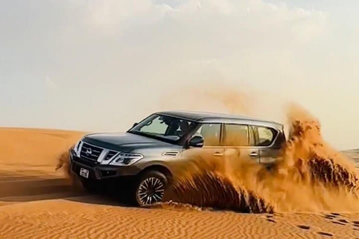 Dubai Evening Private Desert Safari with BBQ Dinner — Dune Bashing, Camel Ride & Live Shows