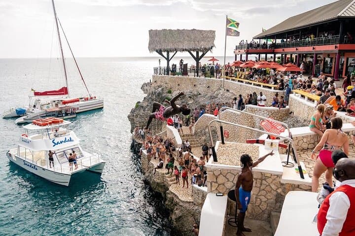 Discover Negril's Vibrant Culture: 7 Mile Beach, Rick's Cafe & Local Markets