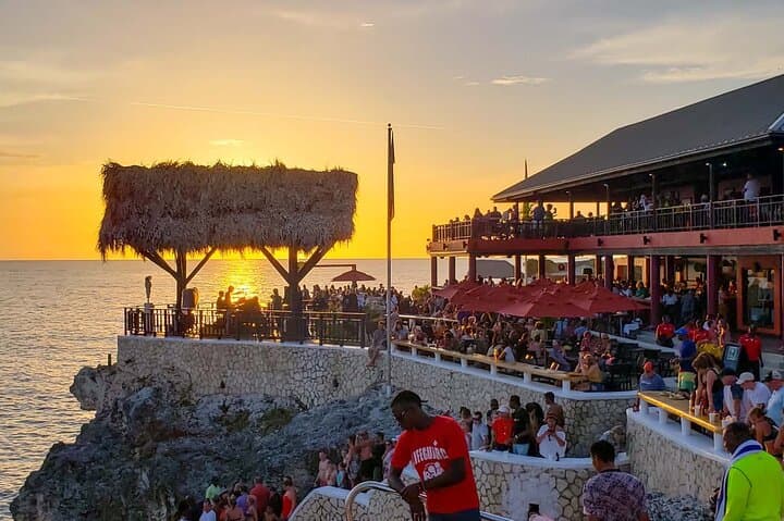 Discover Negril's Vibrant Culture: 7 Mile Beach, Rick's Cafe & Local Markets photo 2
