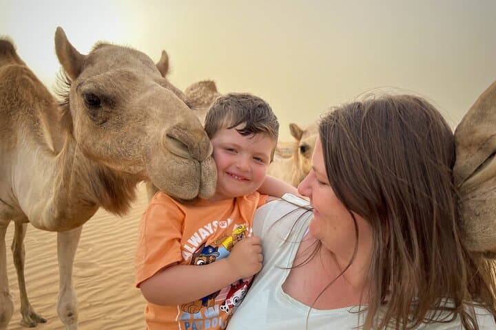 Dubai Red Dunes Desert Safari: BBQ, Camel Ride, Dune Bashing & Sandboarding photo 3