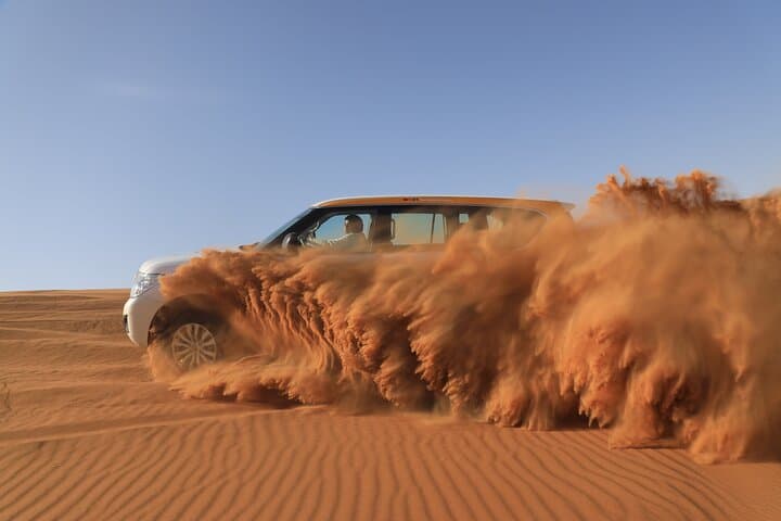 Dubai Evening Desert Safari with Dune Bashing, Camel Ride & BBQ