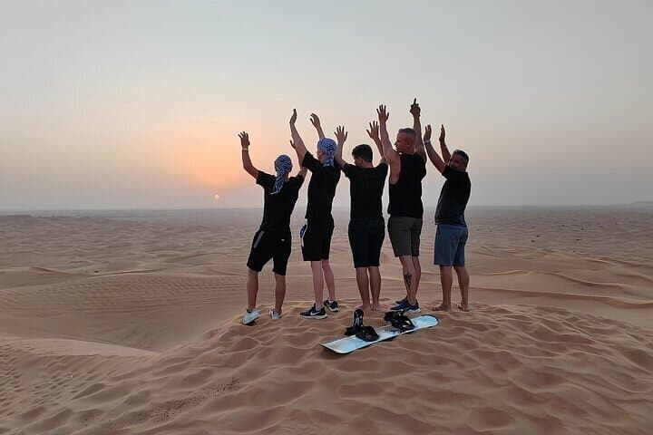Dubai Evening Desert Safari with Camel Ride, Sandboarding & BBQ photo 3