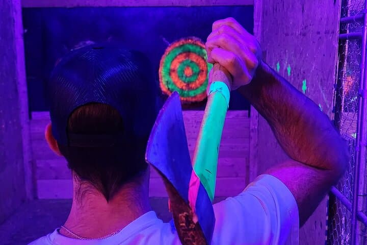 Neon Cosmic Axe Throwing VIP — Axehole Vegas Experience photo 4