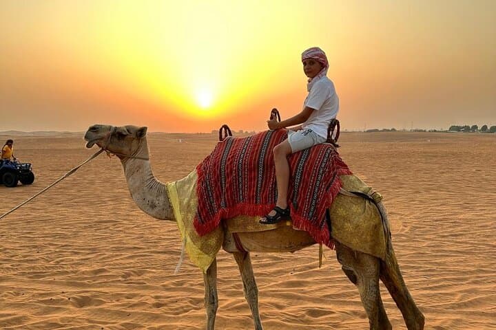 Dubai Evening Desert Safari: Dune Bashing, BBQ & Live Shows at Sunset photo 3