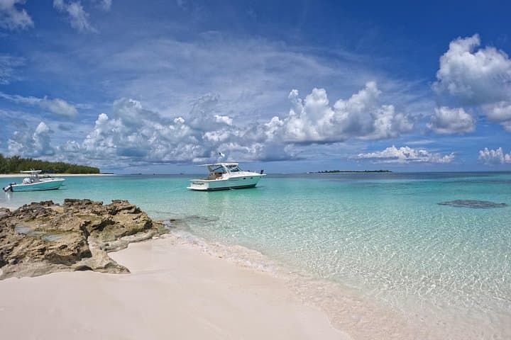 Private Snorkeling & Fishing Charter in Nassau aboard a 38ft Cabin Cruiser photo 2