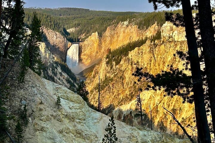 Yellowstone Lower Loop Day Tour from Cody: Old Faithful, Grand Canyon & Hot Springs photo 2
