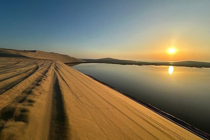 Doha Desert Sunrise & Sunset Tour — Dune Driving, Camel Rides & Sandboarding photo 3